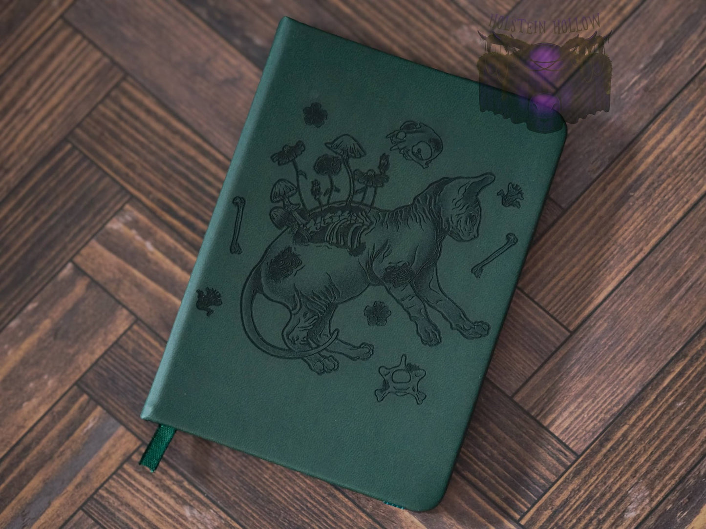 Returned to Earth Green Notebook